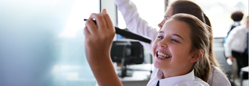Image of young people writing