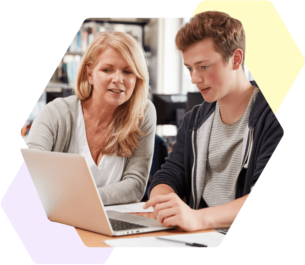 Image of a teacher working with a young person