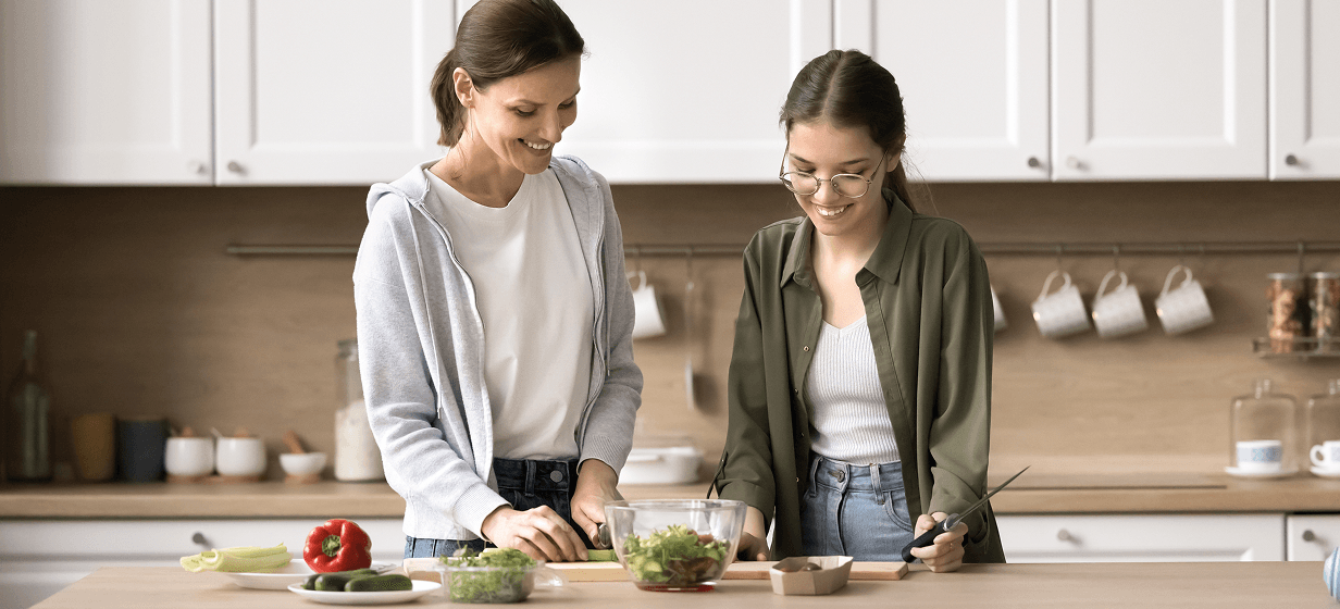 Image of a young person and teacher having a discussion